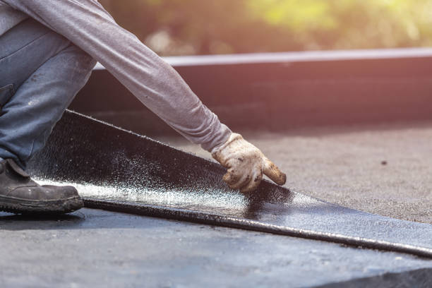 Professional Basement Waterproofing technician working in Howe, IN